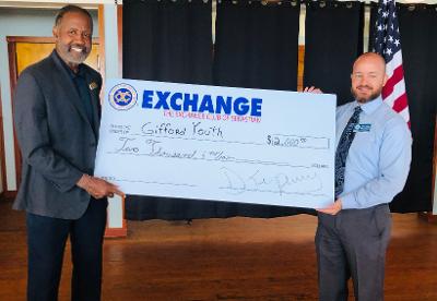 Presiden of Exchange Club of Sebastian Presents 42,000 to GYAC